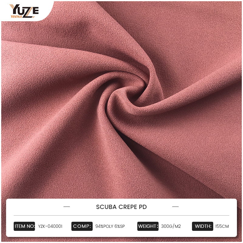 Quais são as vantagens do aplicativo do tecido Moss Crepe no campo da alta costura e como isso pode trazer uma experiência única para designers e consumidores?